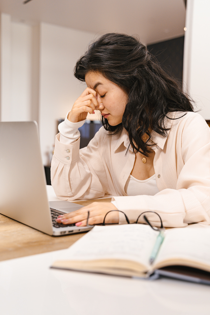 Woman Frustrated at Laptop